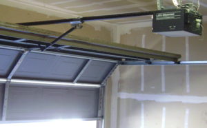 Chain drive sectional up and over garage door